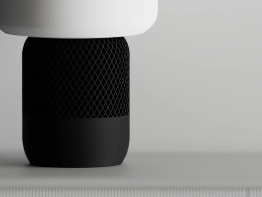 Lámpara Homie 3D encendida, diseño minimalista con luz cálida y base negra – Prinx.